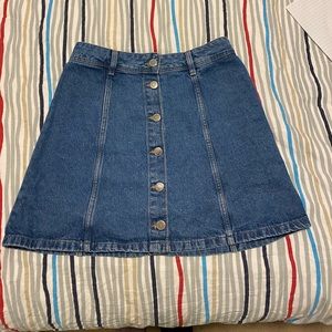 Denim button front skirt . A line